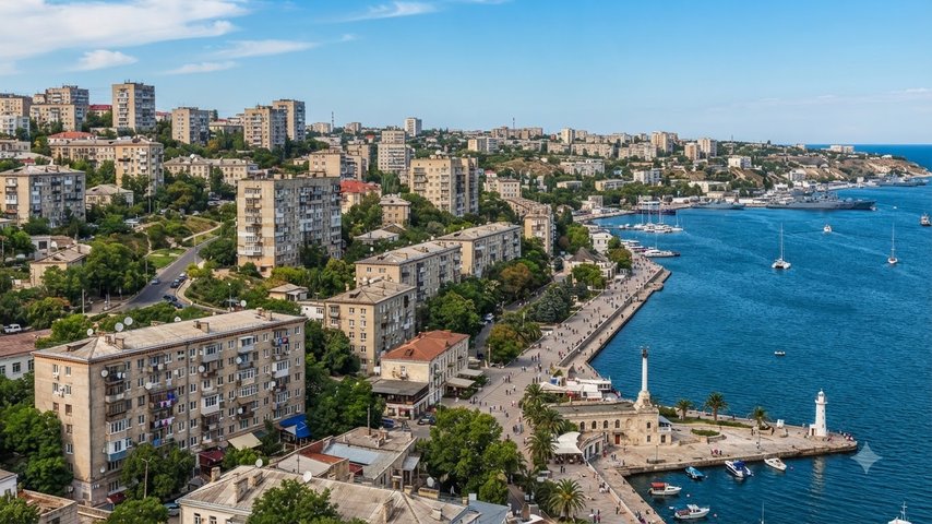 Apartment_buildings_in_coastal_city_20261001224305_2